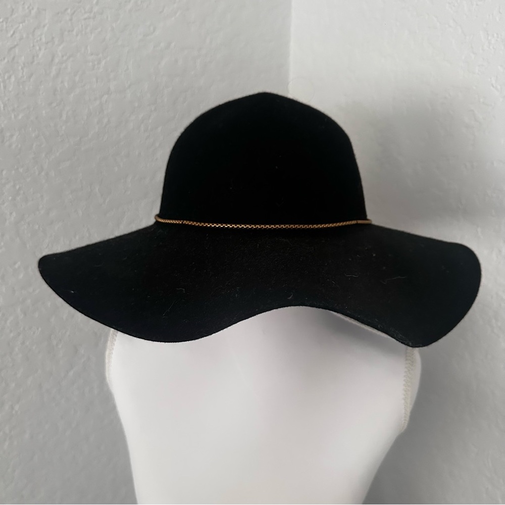 Elegant Black Wide-Brim Hat with Gold Accent